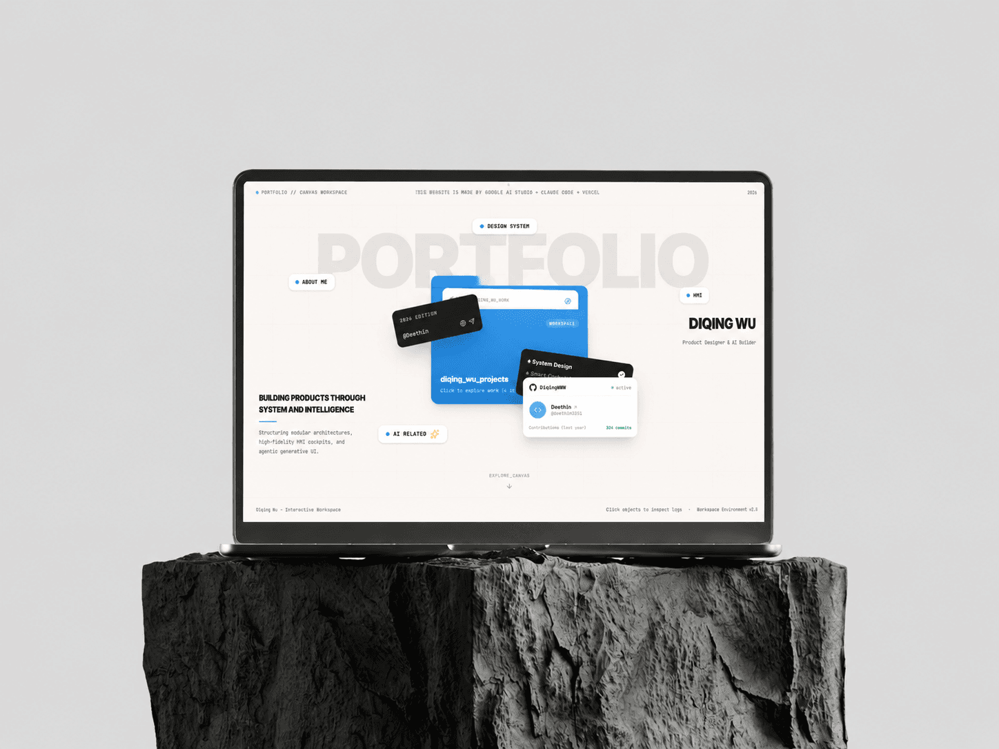 Portfolio workspace displayed on a laptop above a dark sculptural plinth